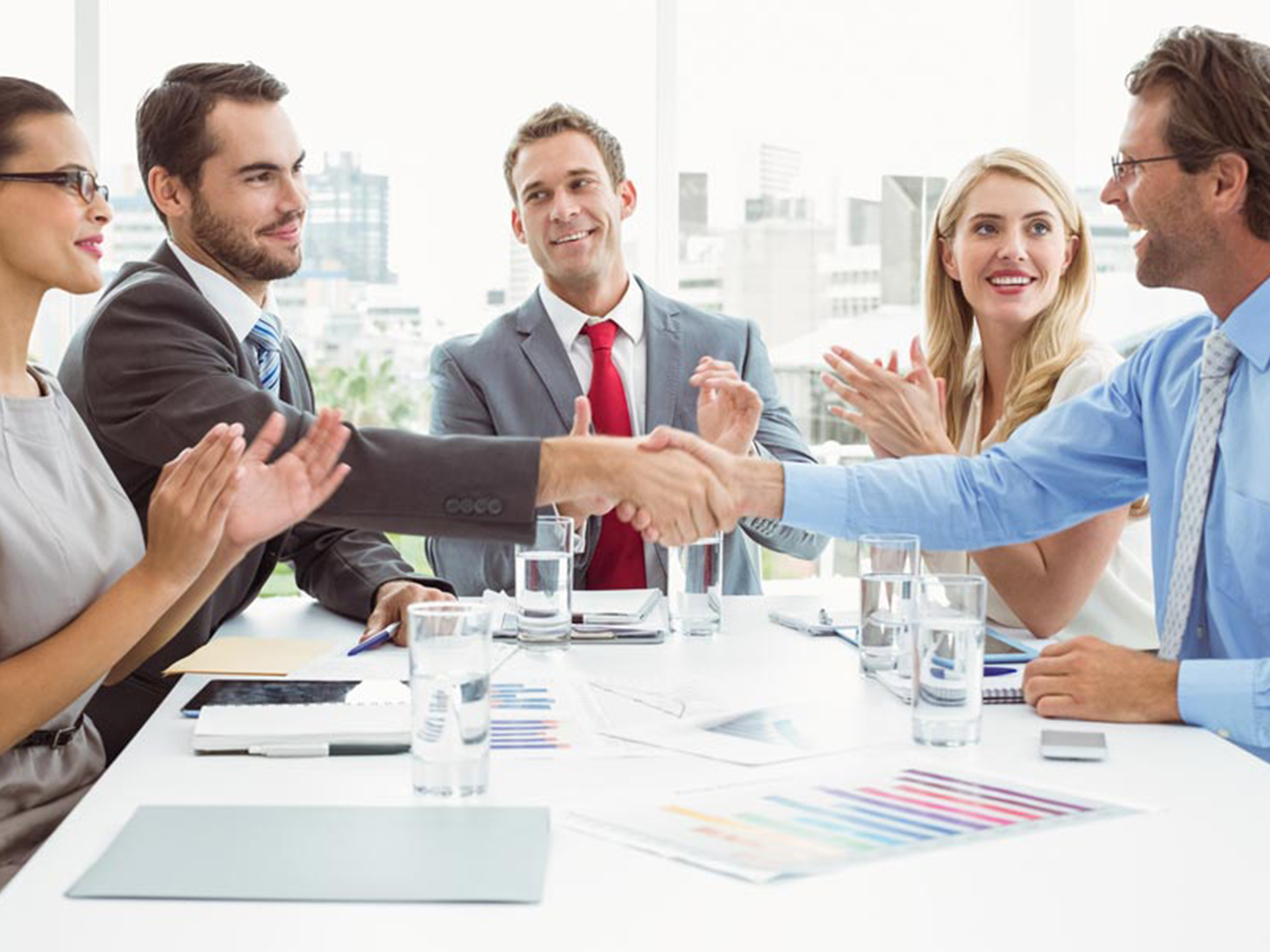 Business support specialists working with a client
